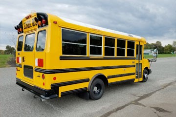 Yellow school bus during day