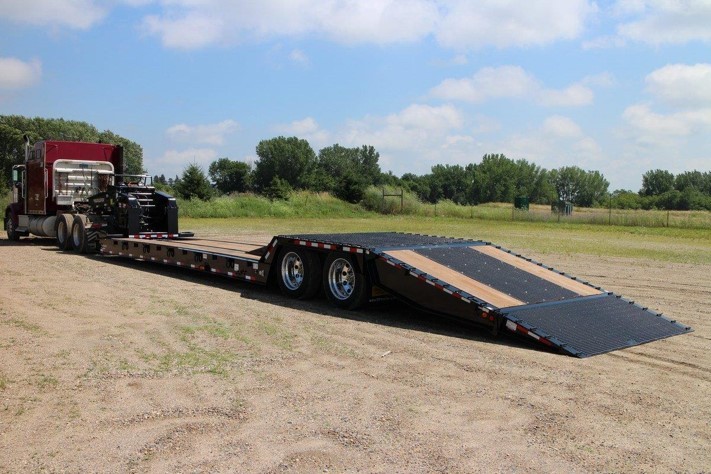Black Towmaster trailer with loading lift