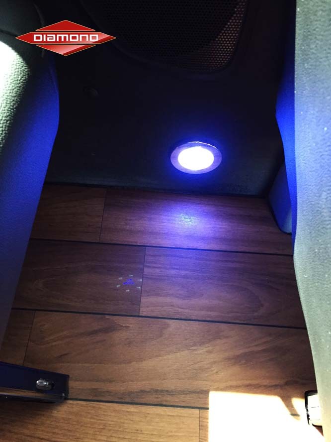 Close up of light on floor in van